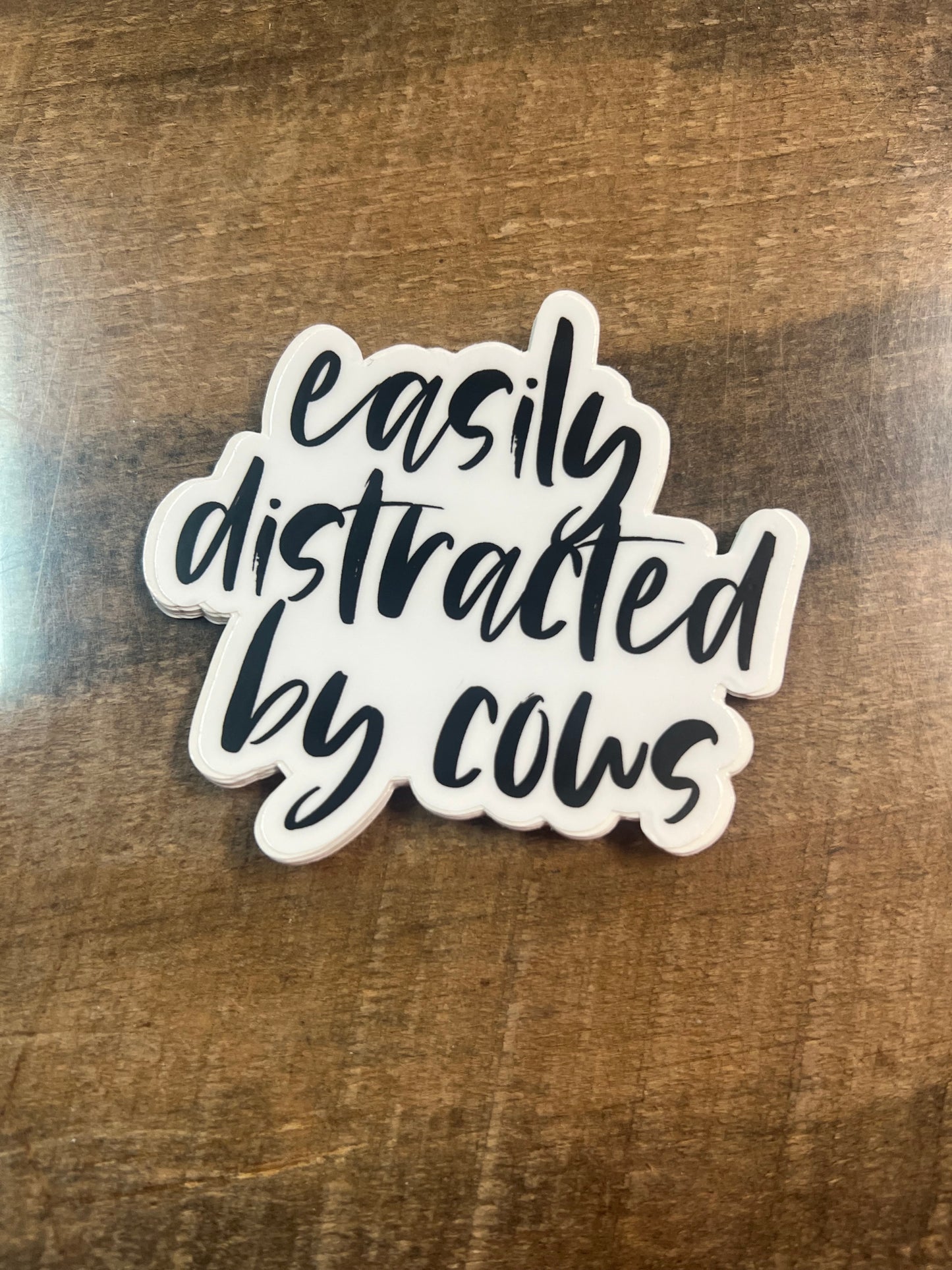 Easily Distracted by Cows Sticker